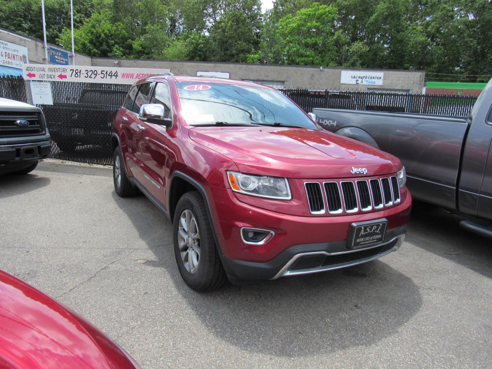 2014 Burgandy /Black Jeep Grand Cherokee Limited 4WD (1C4RJFBG7EC) with an 3.6L V6 DOHC 24V engine, 5-Speed Automatic transmission, located at 215 Milton St, Dedham, MA, 02026, (781) 329-5144, 42.241905, -71.157295 - This nice Jeep Limited is in excellent condition. Fully serviced and certified. Comes with a 3/3 nationwide warranty included in the price. Call for details. Prices on all vehicles do not include $299.95 Documentation fee, as well as Massachusetts sales tax, Registration, Title Fee and State ins - Photo #0