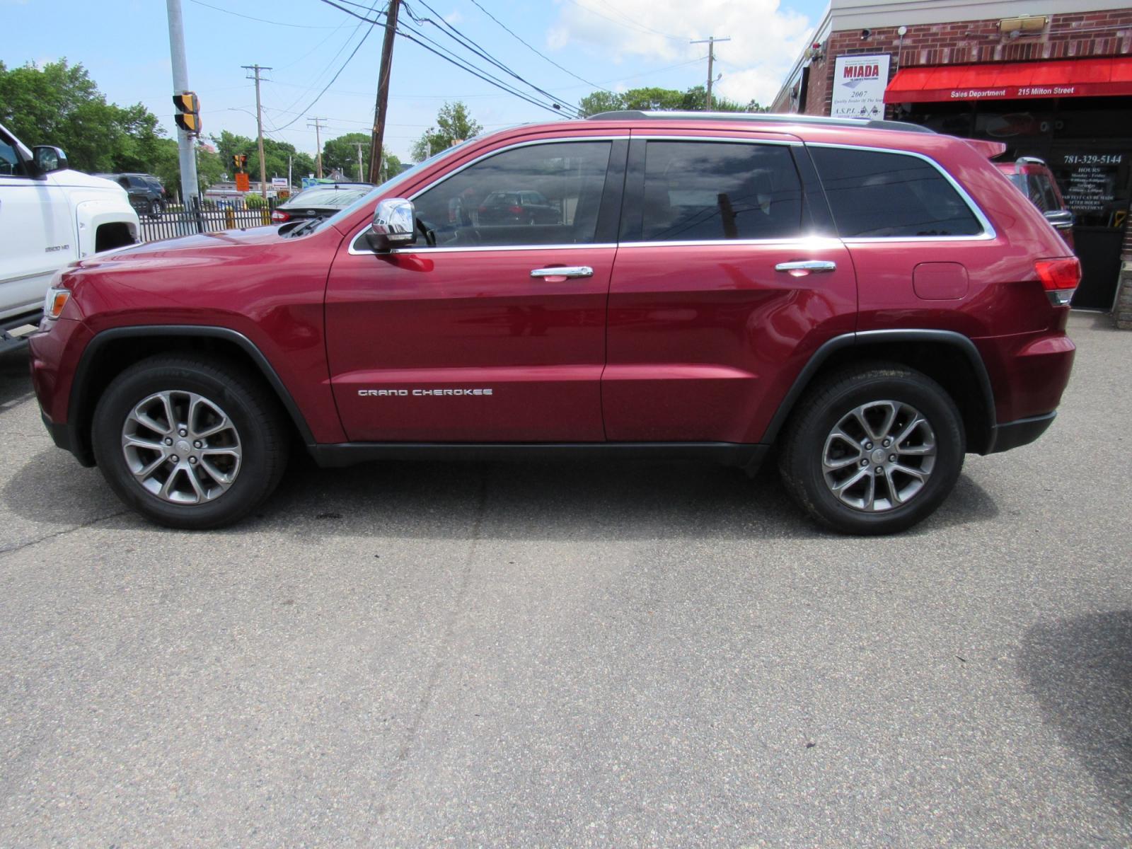 2014 Burgandy /Black Jeep Grand Cherokee Limited 4WD (1C4RJFBG7EC) with an 3.6L V6 DOHC 24V engine, 5-Speed Automatic transmission, located at 215 Milton St, Dedham, MA, 02026, (781) 329-5144, 42.241905, -71.157295 - This nice Jeep Limited is in excellent condition. Fully serviced and certified. Comes with a 3/3 nationwide warranty included in the price. Call for details. Prices on all vehicles do not include $299.95 Documentation fee, as well as Massachusetts sales tax, Registration, Title Fee and State ins - Photo #3
