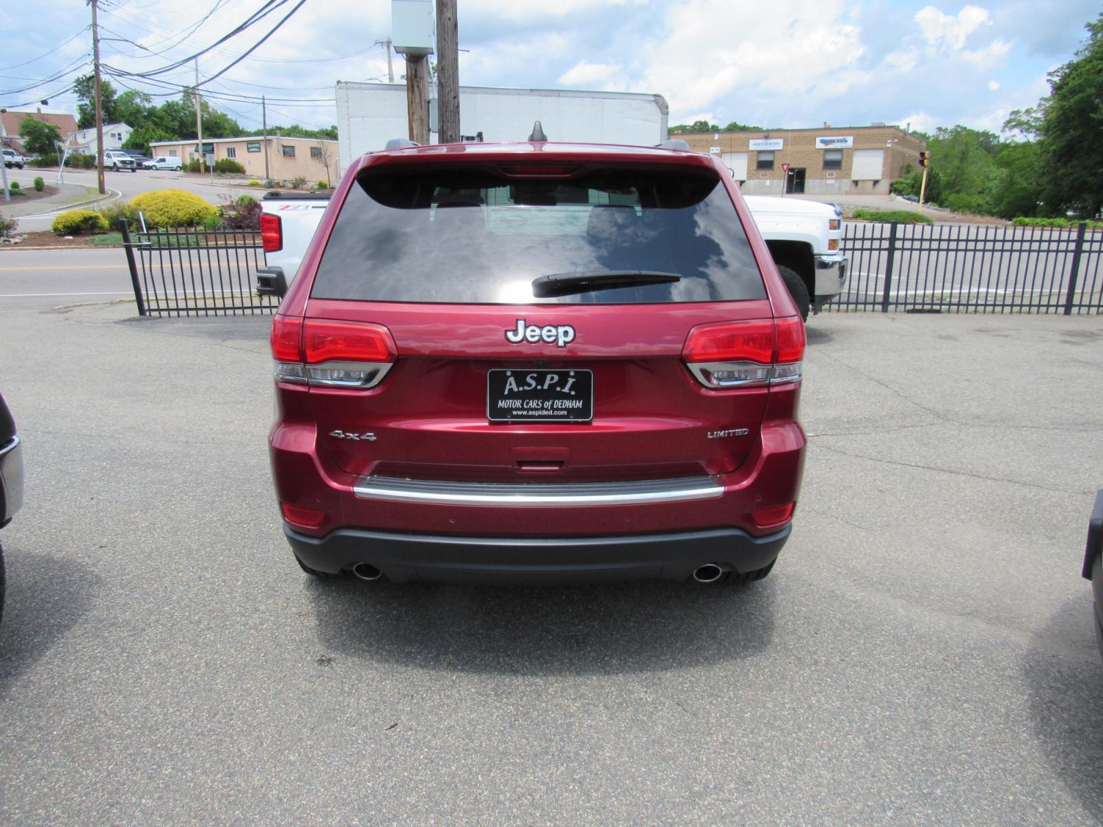 2014 Burgandy /Black Jeep Grand Cherokee Limited 4WD (1C4RJFBG7EC) with an 3.6L V6 DOHC 24V engine, 5-Speed Automatic transmission, located at 215 Milton St, Dedham, MA, 02026, (781) 329-5144, 42.241905, -71.157295 - This nice Jeep Limited is in excellent condition. Fully serviced and certified. Comes with a 3/3 nationwide warranty included in the price. Call for details. Prices on all vehicles do not include $299.95 Documentation fee, as well as Massachusetts sales tax, Registration, Title Fee and State ins - Photo #5