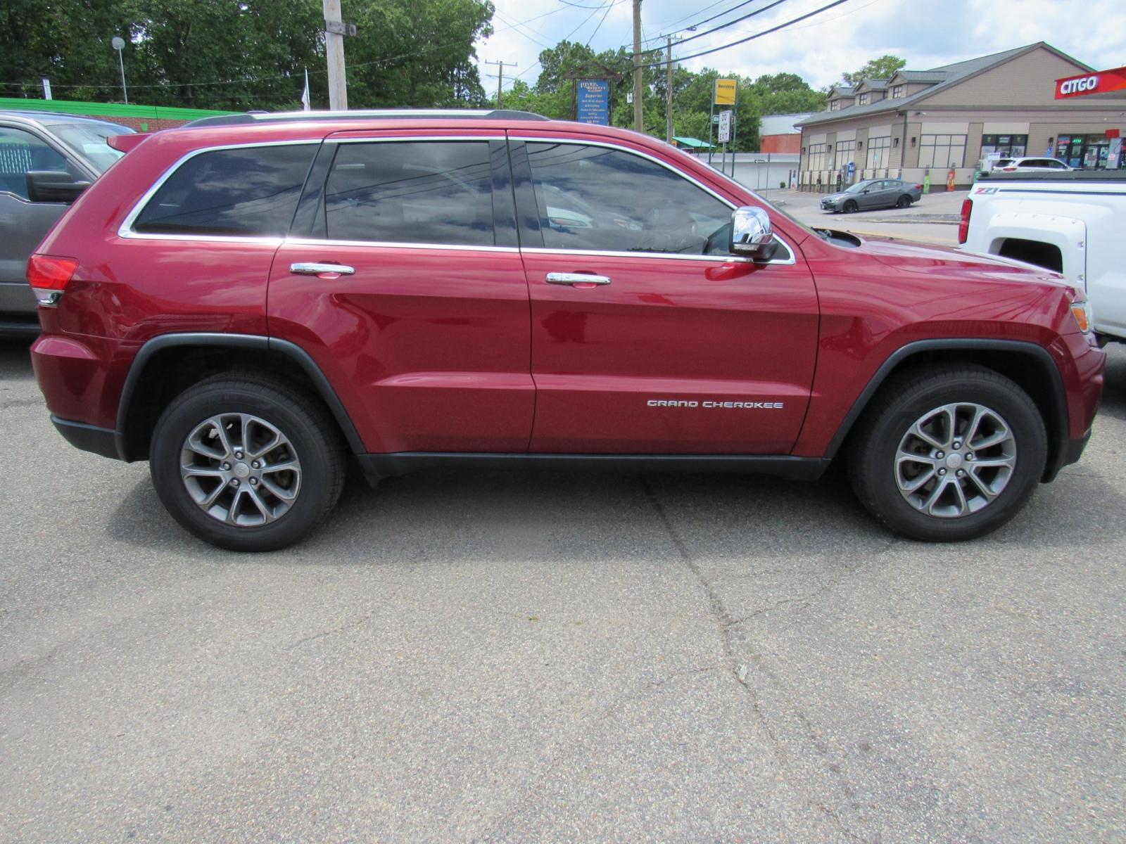 2014 Burgandy /Black Jeep Grand Cherokee Limited 4WD (1C4RJFBG7EC) with an 3.6L V6 DOHC 24V engine, 5-Speed Automatic transmission, located at 215 Milton St, Dedham, MA, 02026, (781) 329-5144, 42.241905, -71.157295 - This nice Jeep Limited is in excellent condition. Fully serviced and certified. Comes with a 3/3 nationwide warranty included in the price. Call for details. Prices on all vehicles do not include $299.95 Documentation fee, as well as Massachusetts sales tax, Registration, Title Fee and State ins - Photo #7